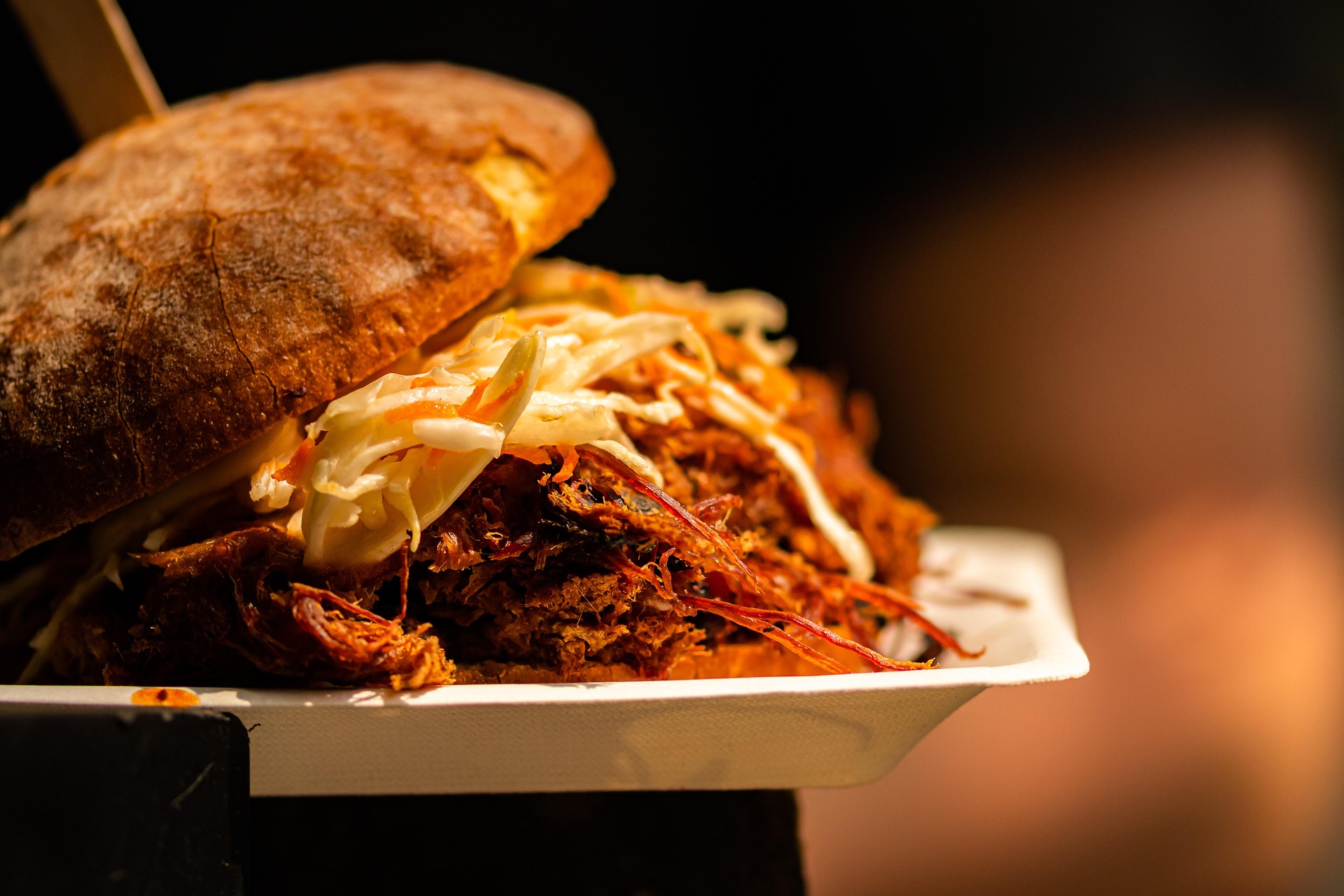Pulled meat sandwich served at a street food stall